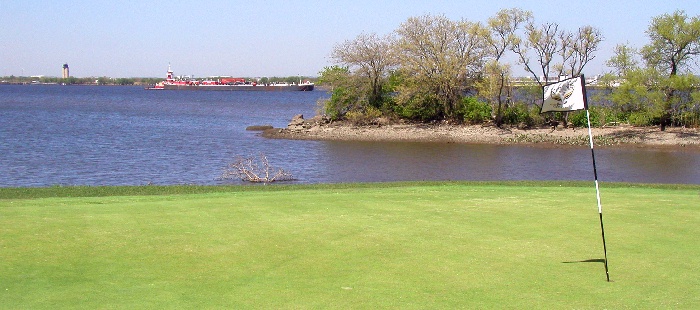 River Winds Golf Club - Hole 17 Side View with Delaware River and Ocean Freighter  in background